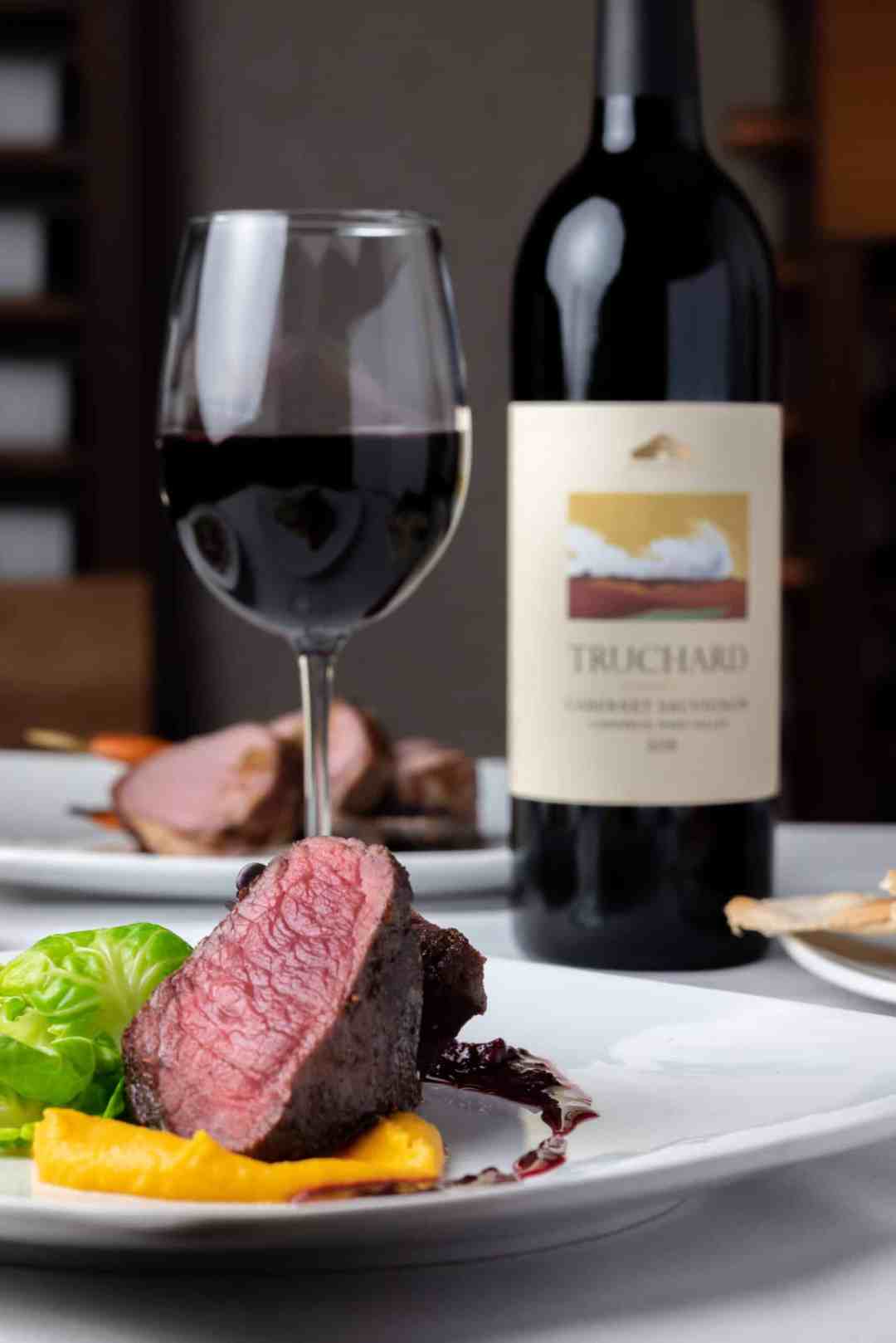 Restaurant Anise Contact Us Vertical Image with wine and steak